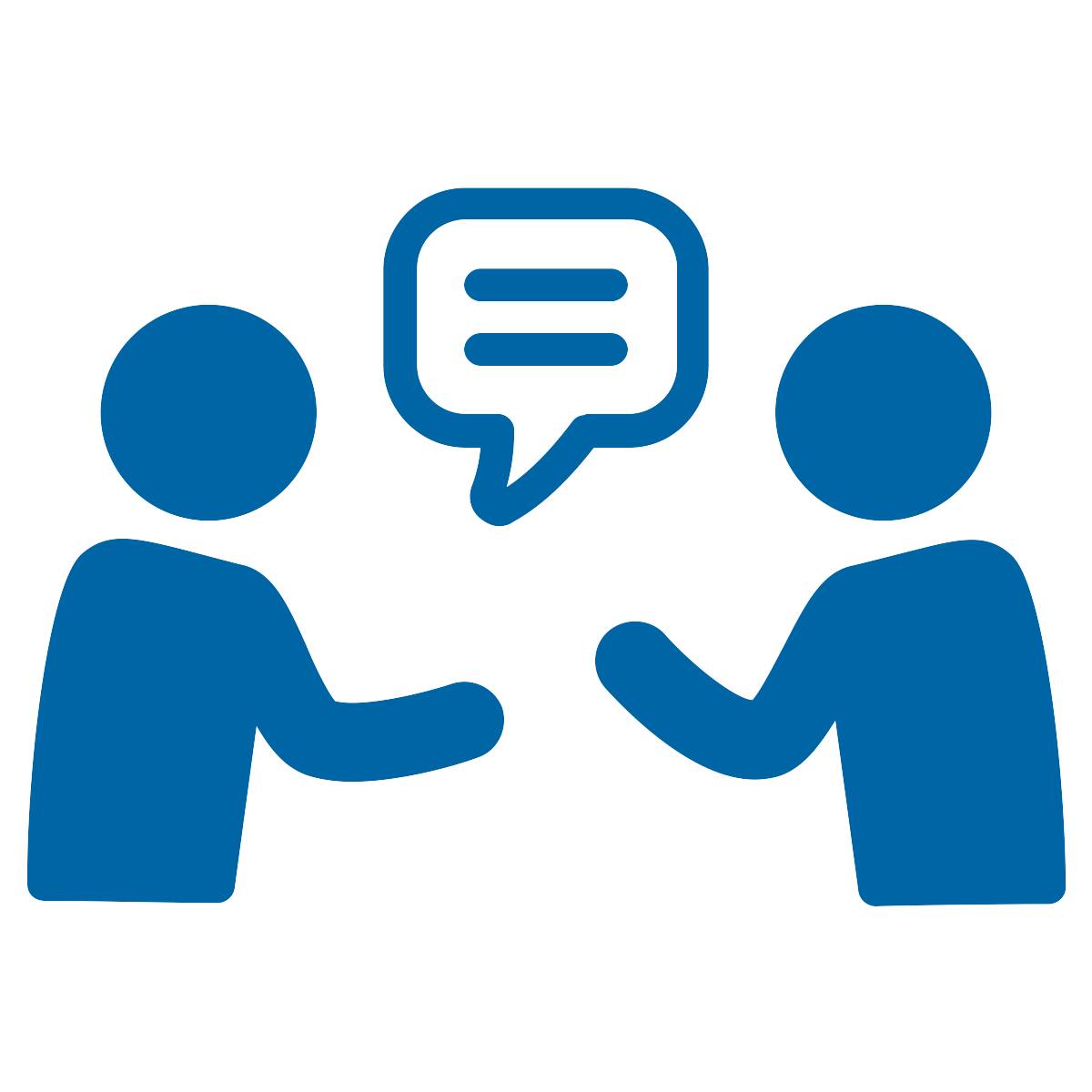 image of two people talking to one another